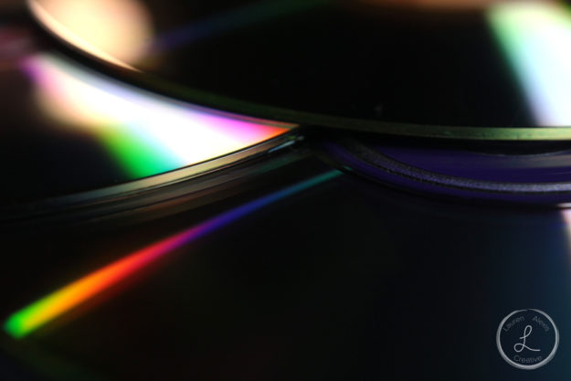 extraordinary shot, rainbow reflections of a cd, cd reflections, rainbow, macro cd, macro still life