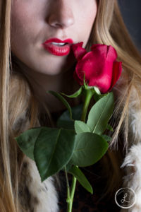 Womens fashion, womens makeup, womens lipstick, red lips, red lips with red rose, makeup with rose, fur coat, fur coat with rose